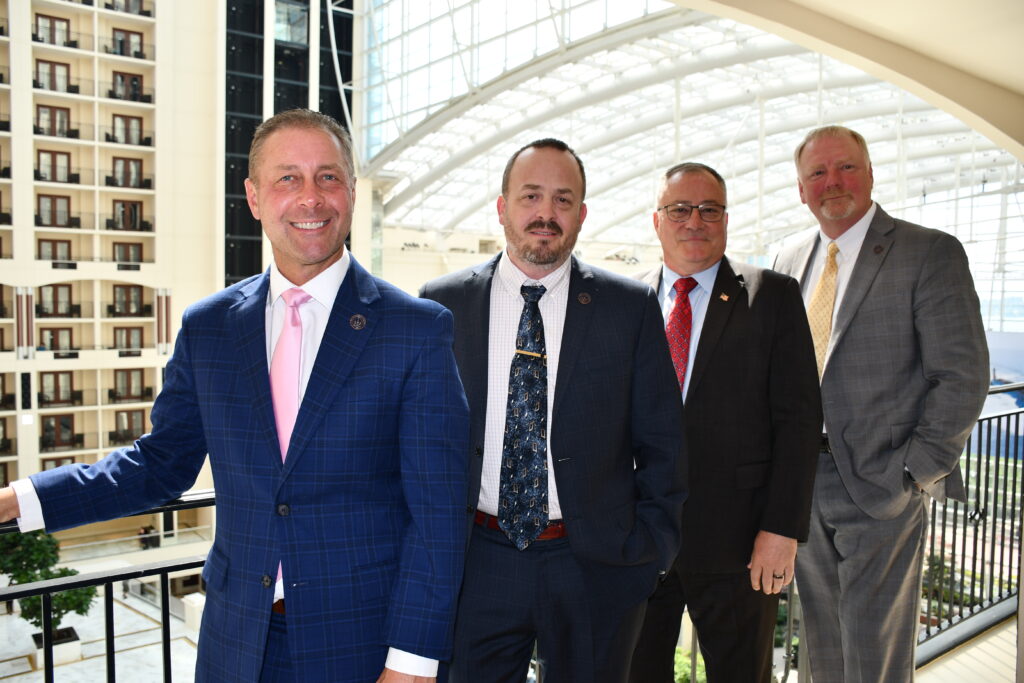 Defense Industry Advisors Team at Industry event Sea Air Space. Defense Consultants at Defense Tradeshow.